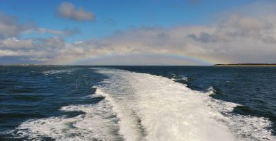 Bugstrahl mit Regenbogen Ausblick aufs Wattenmeer